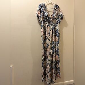 Yumi Kim Navy and Peach Floral jumpsuit - size large - puff sleeve - open back
